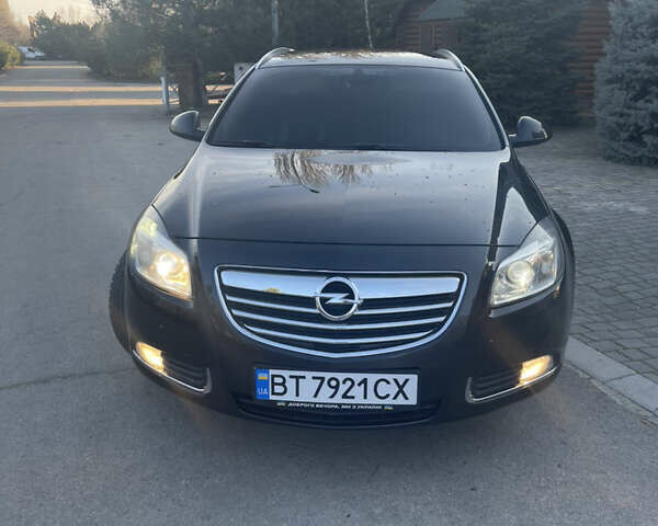 Чорний Опель Інсігнія, об'ємом двигуна 1.96 л та пробігом 255 тис. км за 9000 $, фото 1 на Automoto.ua