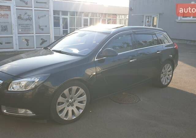 Черный Опель Инсигния, объемом двигателя 1.96 л и пробегом 315 тыс. км за 9000 $, фото 1 на Automoto.ua