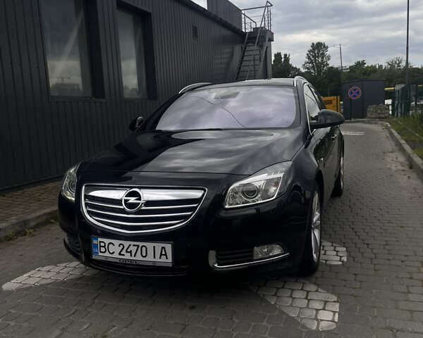 Черный Опель Инсигния, объемом двигателя 1.96 л и пробегом 300 тыс. км за 10400 $, фото 10 на Automoto.ua