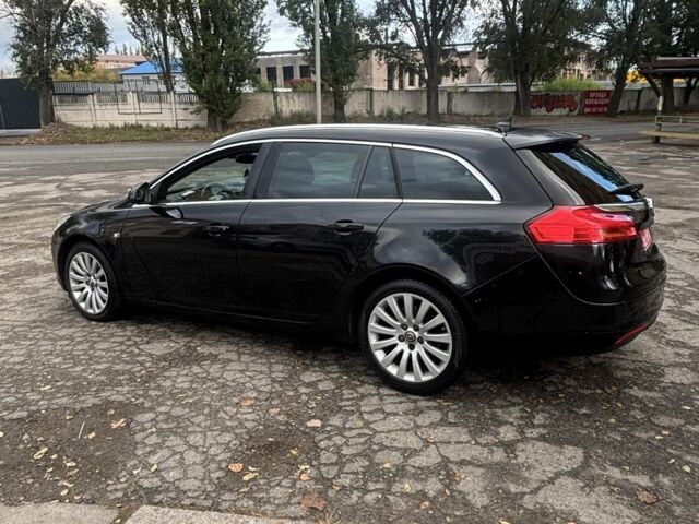 Чорний Опель Інсігнія, об'ємом двигуна 2 л та пробігом 333 тис. км за 10150 $, фото 2 на Automoto.ua