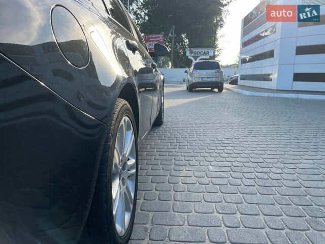 Черный Опель Инсигния, объемом двигателя 1.96 л и пробегом 305 тыс. км за 6200 $, фото 6 на Automoto.ua