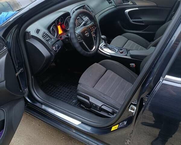 Чорний Опель Інсігнія, об'ємом двигуна 1.96 л та пробігом 240 тис. км за 8888 $, фото 24 на Automoto.ua