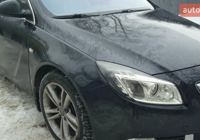 Чорний Опель Інсігнія, об'ємом двигуна 1.96 л та пробігом 247 тис. км за 9499 $, фото 1 на Automoto.ua