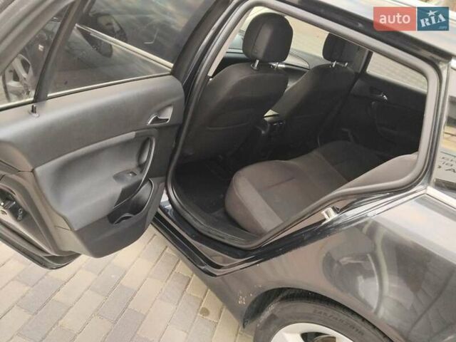 Черный Опель Инсигния, объемом двигателя 1.4 л и пробегом 344 тыс. км за 6800 $, фото 3 на Automoto.ua