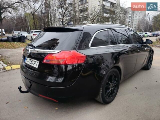 Чорний Опель Інсігнія, об'ємом двигуна 2 л та пробігом 292 тис. км за 5650 $, фото 2 на Automoto.ua
