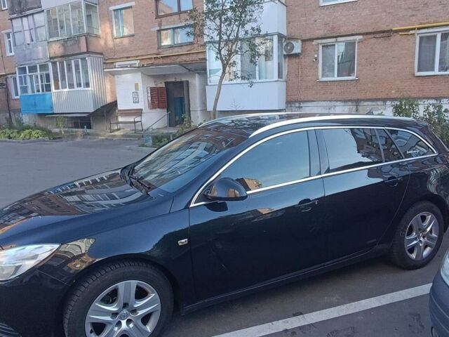 Черный Опель Инсигния, объемом двигателя 2 л и пробегом 240 тыс. км за 6900 $, фото 2 на Automoto.ua