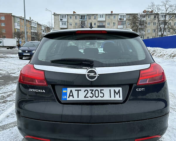 Чорний Опель Інсігнія, об'ємом двигуна 2 л та пробігом 262 тис. км за 7700 $, фото 4 на Automoto.ua