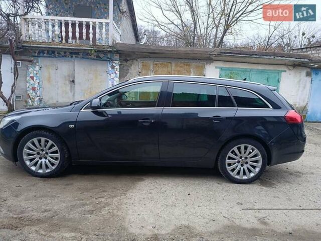 Чорний Опель Інсігнія, об'ємом двигуна 1.96 л та пробігом 240 тис. км за 8888 $, фото 4 на Automoto.ua