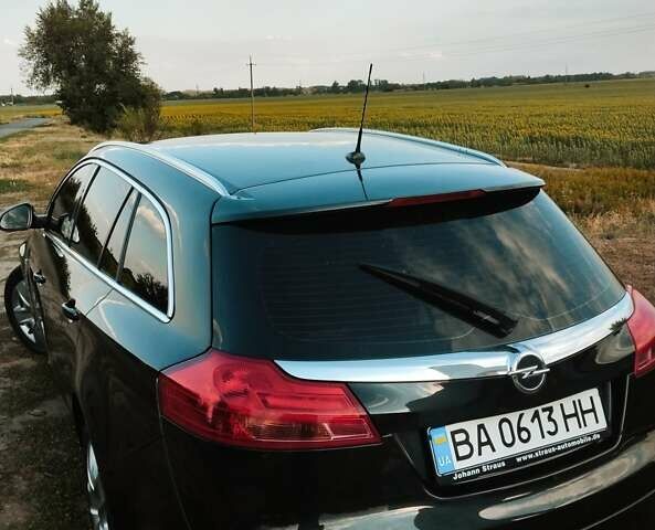 Черный Опель Инсигния, объемом двигателя 1.96 л и пробегом 293 тыс. км за 8100 $, фото 1 на Automoto.ua