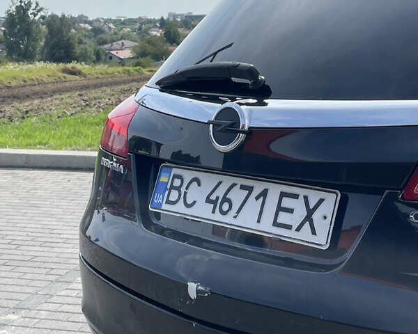 Чорний Опель Інсігнія, об'ємом двигуна 1.96 л та пробігом 256 тис. км за 8175 $, фото 13 на Automoto.ua