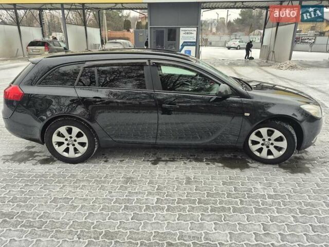 Черный Опель Инсигния, объемом двигателя 1.96 л и пробегом 259 тыс. км за 8350 $, фото 14 на Automoto.ua