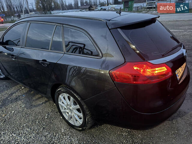 Чорний Опель Інсігнія, об'ємом двигуна 1.96 л та пробігом 205 тис. км за 8000 $, фото 4 на Automoto.ua