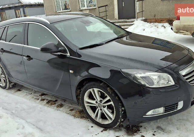 Чорний Опель Інсігнія, об'ємом двигуна 1.96 л та пробігом 176 тис. км за 10950 $, фото 2 на Automoto.ua