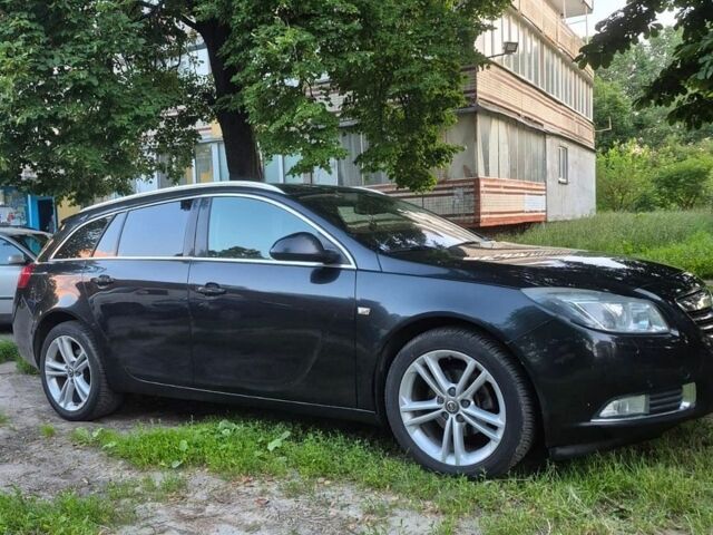 Черный Опель Инсигния, объемом двигателя 1.36 л и пробегом 240 тыс. км за 6700 $, фото 5 на Automoto.ua