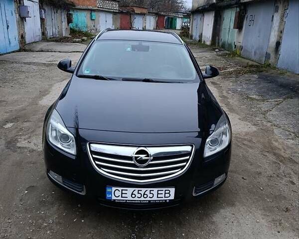 Чорний Опель Інсігнія, об'ємом двигуна 1.96 л та пробігом 240 тис. км за 8888 $, фото 17 на Automoto.ua