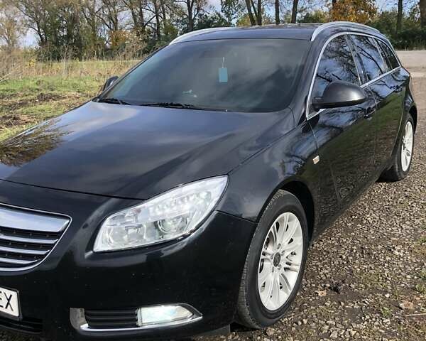 Чорний Опель Інсігнія, об'ємом двигуна 1.96 л та пробігом 370 тис. км за 9000 $, фото 1 на Automoto.ua