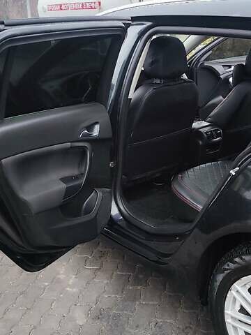 Черный Опель Инсигния, объемом двигателя 1.96 л и пробегом 245 тыс. км за 8599 $, фото 4 на Automoto.ua