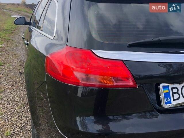 Черный Опель Инсигния, объемом двигателя 1.96 л и пробегом 320 тыс. км за 8000 $, фото 1 на Automoto.ua