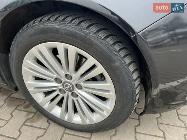 Черный Опель Инсигния, объемом двигателя 1.96 л и пробегом 255 тыс. км за 7700 $, фото 5 на Automoto.ua