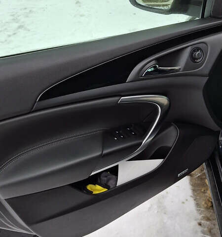 Чорний Опель Інсігнія, об'ємом двигуна 1.96 л та пробігом 176 тис. км за 10950 $, фото 12 на Automoto.ua