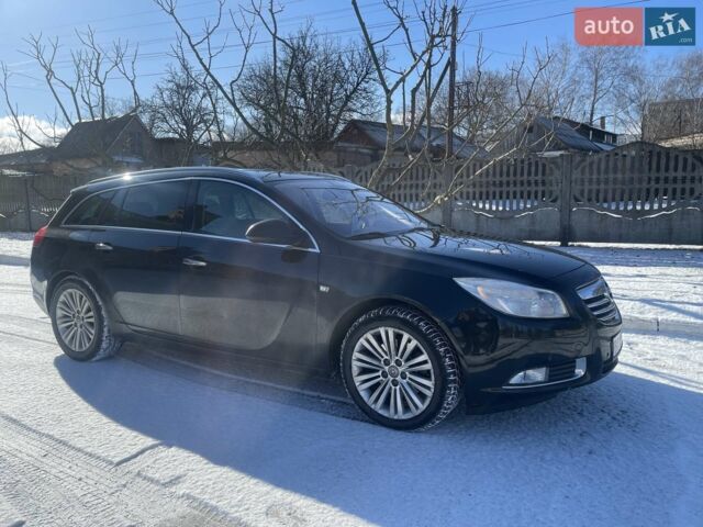 Чорний Опель Інсігнія, об'ємом двигуна 2 л та пробігом 277 тис. км за 9300 $, фото 1 на Automoto.ua