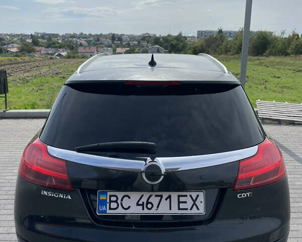 Чорний Опель Інсігнія, об'ємом двигуна 1.96 л та пробігом 256 тис. км за 8175 $, фото 16 на Automoto.ua
