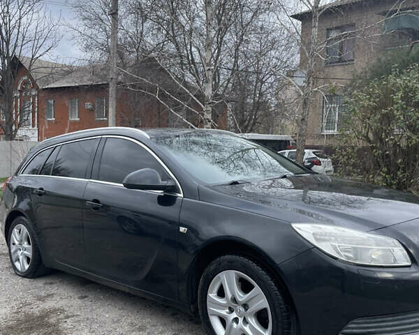 Чорний Опель Інсігнія, об'ємом двигуна 2 л та пробігом 220 тис. км за 7500 $, фото 4 на Automoto.ua