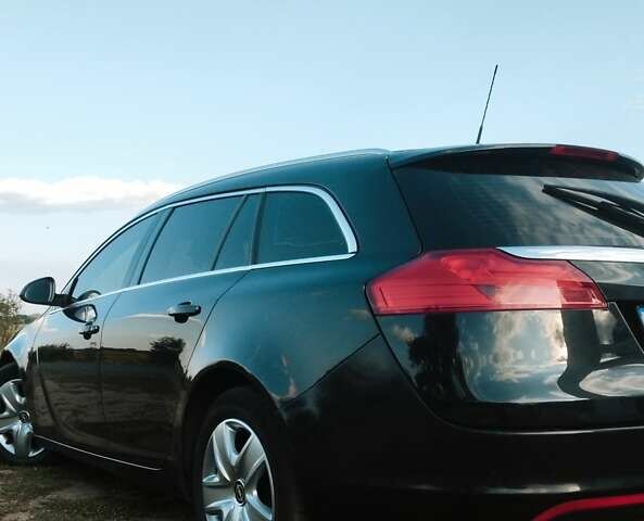 Черный Опель Инсигния, объемом двигателя 1.96 л и пробегом 293 тыс. км за 8100 $, фото 16 на Automoto.ua