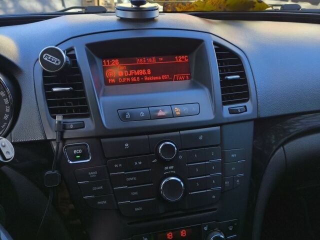 Черный Опель Инсигния, объемом двигателя 2 л и пробегом 304 тыс. км за 7700 $, фото 6 на Automoto.ua