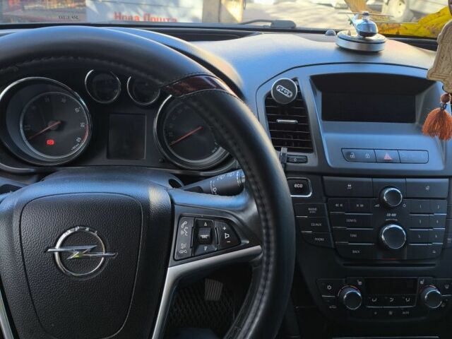 Черный Опель Инсигния, объемом двигателя 2 л и пробегом 304 тыс. км за 7700 $, фото 4 на Automoto.ua