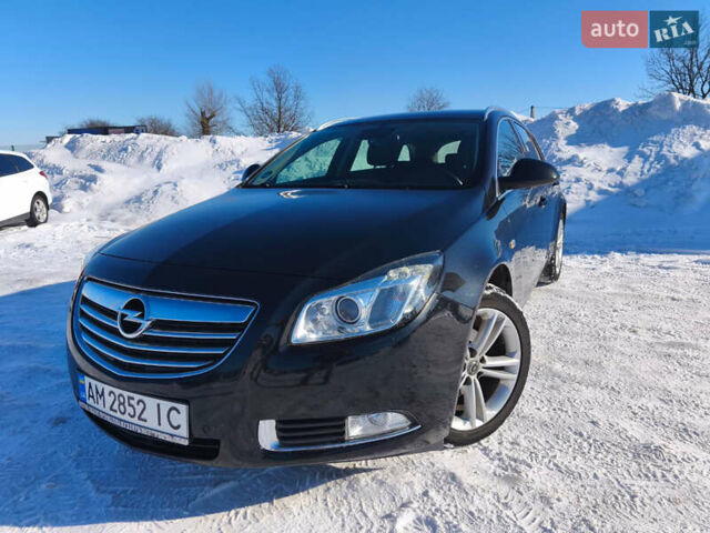 Чорний Опель Інсігнія, об'ємом двигуна 1.96 л та пробігом 210 тис. км за 8999 $, фото 1 на Automoto.ua