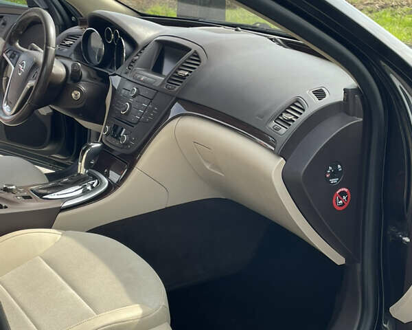 Чорний Опель Інсігнія, об'ємом двигуна 1.96 л та пробігом 256 тис. км за 8175 $, фото 17 на Automoto.ua