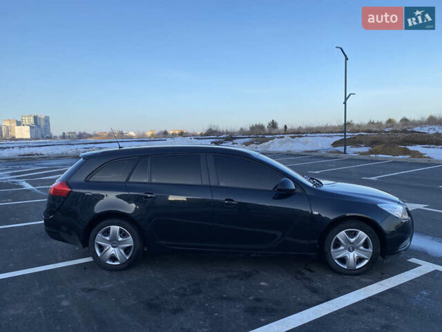 Черный Опель Инсигния, объемом двигателя 1.96 л и пробегом 275 тыс. км за 6500 $, фото 5 на Automoto.ua