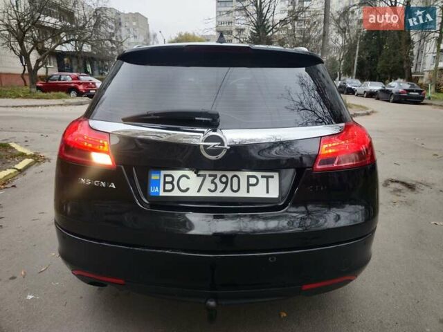 Чорний Опель Інсігнія, об'ємом двигуна 2 л та пробігом 292 тис. км за 5650 $, фото 4 на Automoto.ua