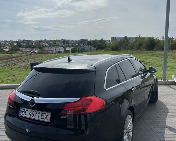 Чорний Опель Інсігнія, об'ємом двигуна 1.96 л та пробігом 256 тис. км за 8175 $, фото 11 на Automoto.ua