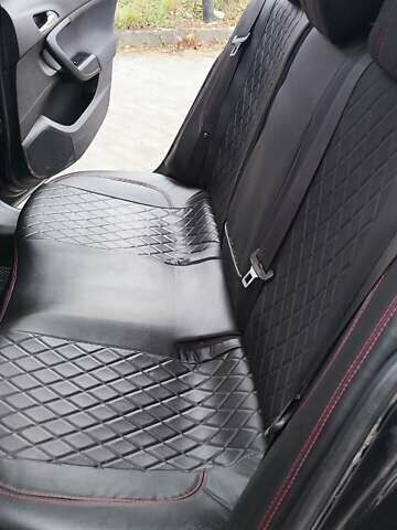 Черный Опель Инсигния, объемом двигателя 1.96 л и пробегом 245 тыс. км за 8599 $, фото 5 на Automoto.ua