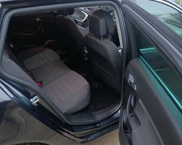 Чорний Опель Інсігнія, об'ємом двигуна 1.96 л та пробігом 240 тис. км за 8888 $, фото 30 на Automoto.ua