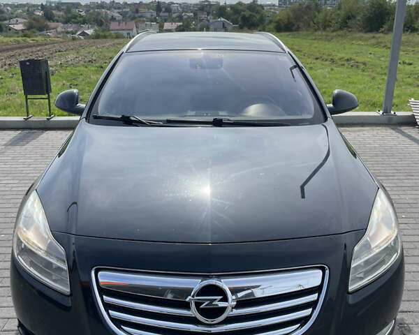 Чорний Опель Інсігнія, об'ємом двигуна 1.96 л та пробігом 256 тис. км за 8175 $, фото 8 на Automoto.ua