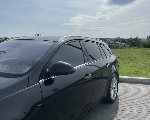 Чорний Опель Інсігнія, об'ємом двигуна 1.96 л та пробігом 256 тис. км за 8175 $, фото 3 на Automoto.ua