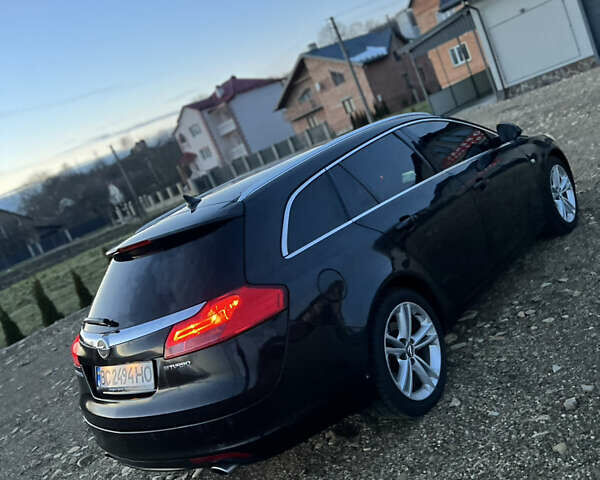 Чорний Опель Інсігнія, об'ємом двигуна 1.96 л та пробігом 255 тис. км за 7000 $, фото 10 на Automoto.ua