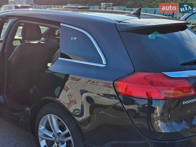 Черный Опель Инсигния, объемом двигателя 1.96 л и пробегом 180 тыс. км за 9900 $, фото 9 на Automoto.ua