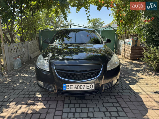 Черный Опель Инсигния, объемом двигателя 1.96 л и пробегом 320 тыс. км за 7000 $, фото 1 на Automoto.ua