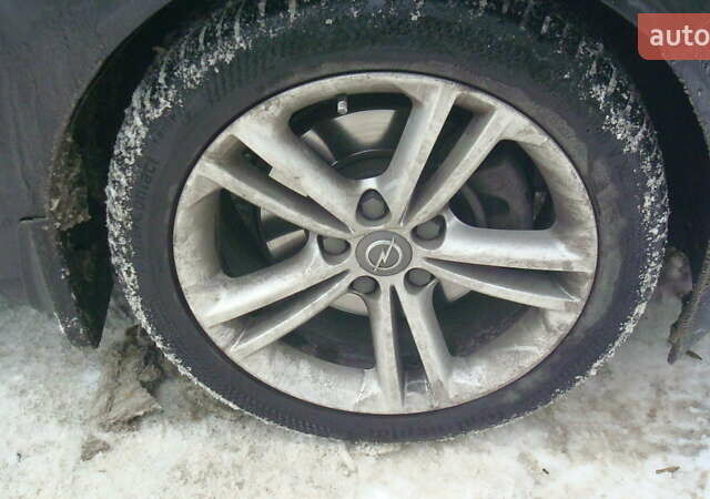 Чорний Опель Інсігнія, об'ємом двигуна 1.96 л та пробігом 247 тис. км за 9499 $, фото 3 на Automoto.ua