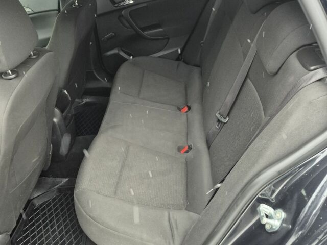 Черный Опель Инсигния, объемом двигателя 2 л и пробегом 259 тыс. км за 8200 $, фото 6 на Automoto.ua