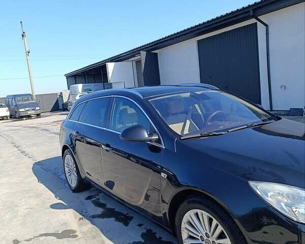 Чорний Опель Інсігнія, об'ємом двигуна 1.96 л та пробігом 270 тис. км за 9200 $, фото 7 на Automoto.ua