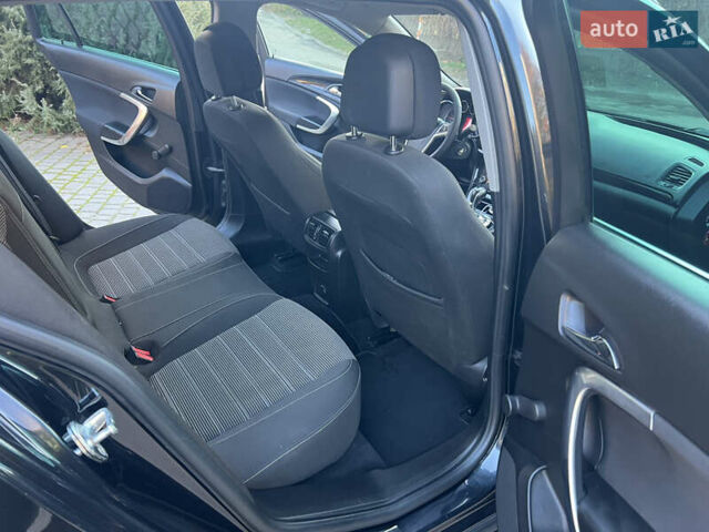 Чорний Опель Інсігнія, об'ємом двигуна 2 л та пробігом 261 тис. км за 8500 $, фото 27 на Automoto.ua