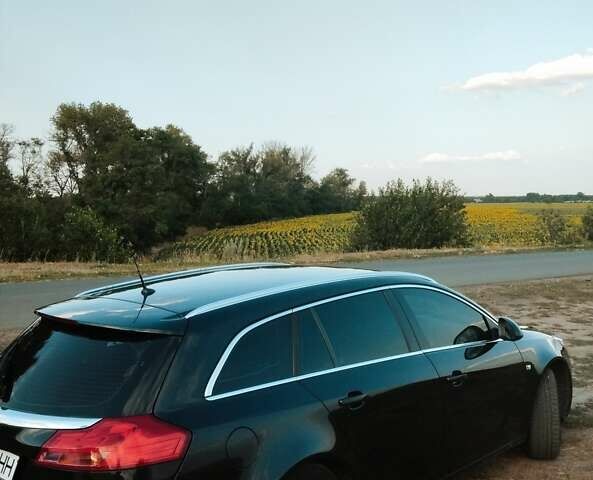 Черный Опель Инсигния, объемом двигателя 1.96 л и пробегом 293 тыс. км за 8100 $, фото 6 на Automoto.ua