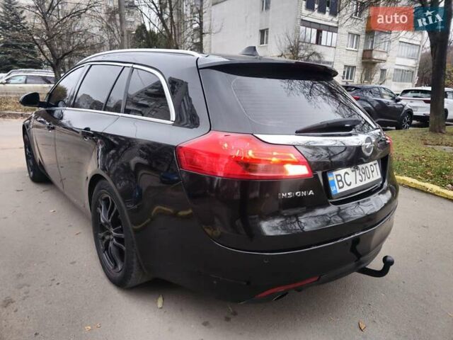 Чорний Опель Інсігнія, об'ємом двигуна 2 л та пробігом 292 тис. км за 5650 $, фото 5 на Automoto.ua