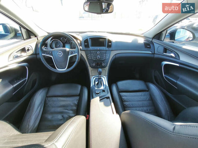 Чорний Опель Інсігнія, об'ємом двигуна 1.96 л та пробігом 210 тис. км за 8999 $, фото 9 на Automoto.ua
