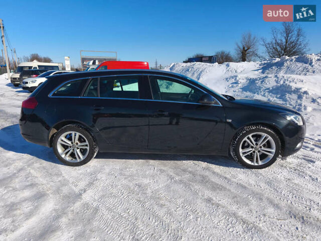 Чорний Опель Інсігнія, об'ємом двигуна 1.96 л та пробігом 210 тис. км за 8999 $, фото 6 на Automoto.ua